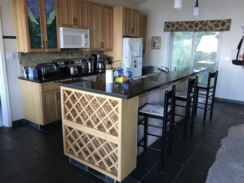 Spacious, well stocked kitchen-perfect for entertaining. 