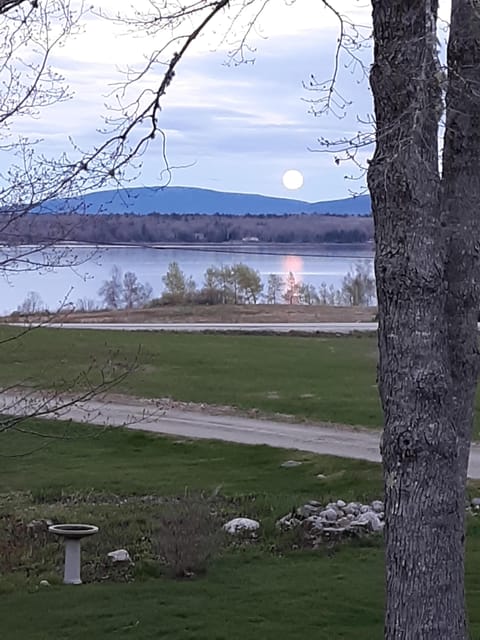 View from the apartment - Full moon rising in May over the mountains of Acadia 