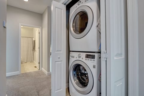 Full size (he) washer/dryer on middle floor with bedrooms