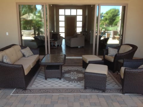 Patio area opens to great room of house.