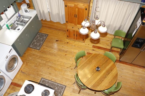 Spacious kitchen is well stocked and full of rustic details. 