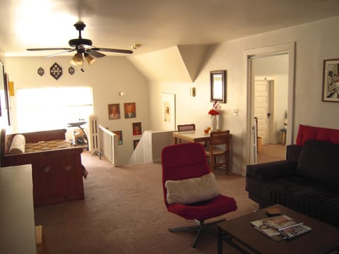 Airy and spacious Living Room with a convertible sleeper sofa and day bed.