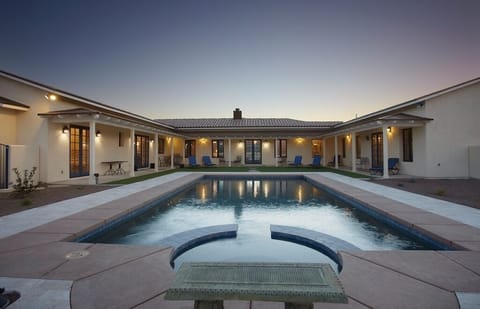 Serene interior courtyard with 38 ft. heated pool and spa.