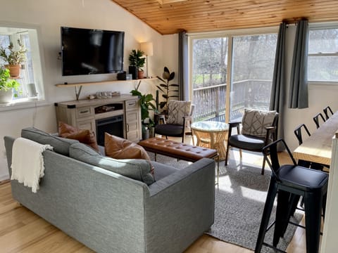 Great room, smart tv, opens onto back deck & large backyard. Queen sleeper sofa 