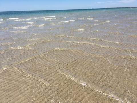 On the beach, sun loungers