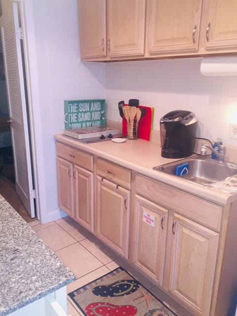 Fridge, microwave, stovetop, coffee/tea maker