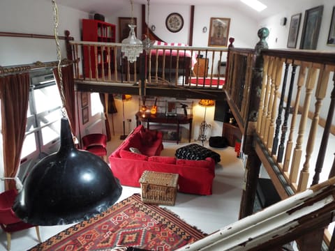 The Gatehouse inside - bedroom above, living and dining below
