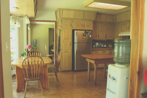 Full kitchen with breakfast nook overlooking the river.