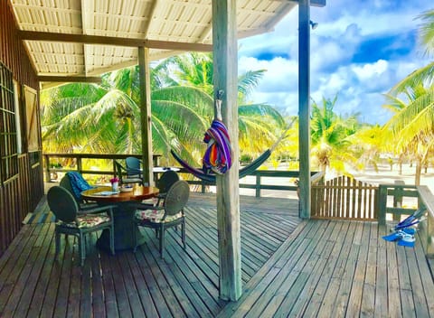 Spacious wrap around veranda with hammocks and the Caribbean breeze.