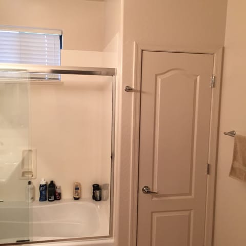 Combined shower/tub, hair dryer, towels, soap