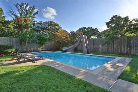 Outdoor pool, a heated pool, sun loungers