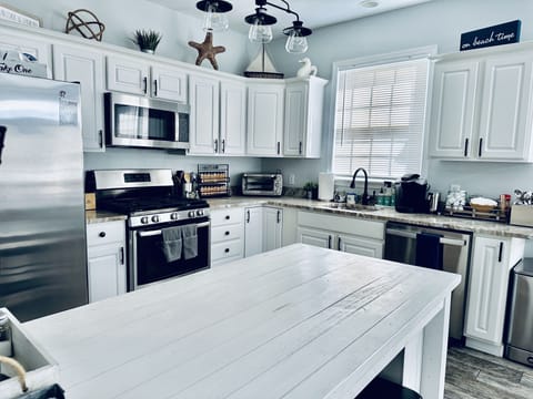 Fully Stocked Kitchen with stainless steal appliances