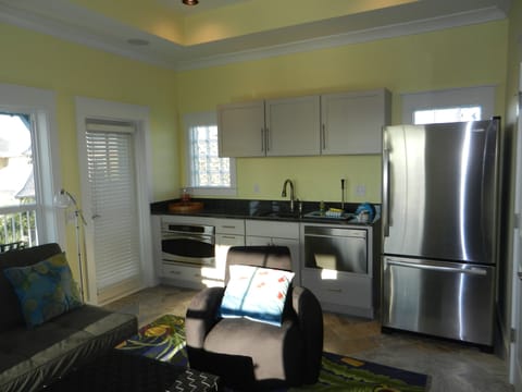 Tower media room w/3rd refrigerator, kitchen & 55" TV. Wrap-around porch w/view