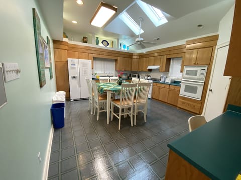 3rd floor Kitchen w/ gas stove/oven  & electric oven/microwave