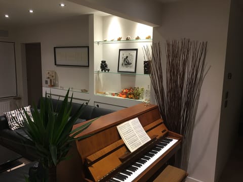 piano and living room area
