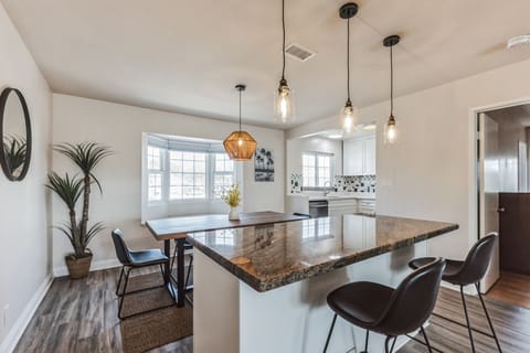 Dining area and island open to living room