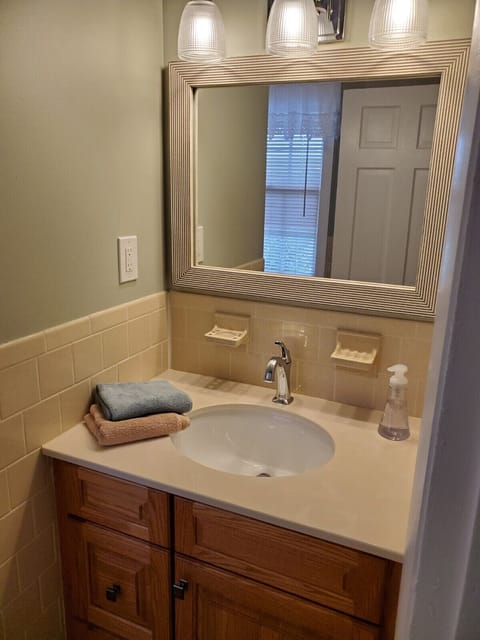 Combined shower/tub, hair dryer, towels, soap