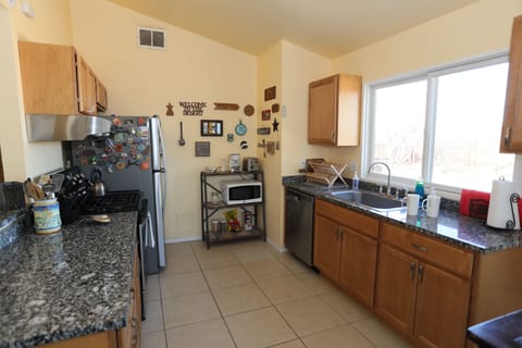 Nearly new fully equipped kitchen.