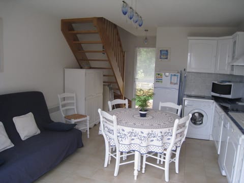 The living room and the kitchen