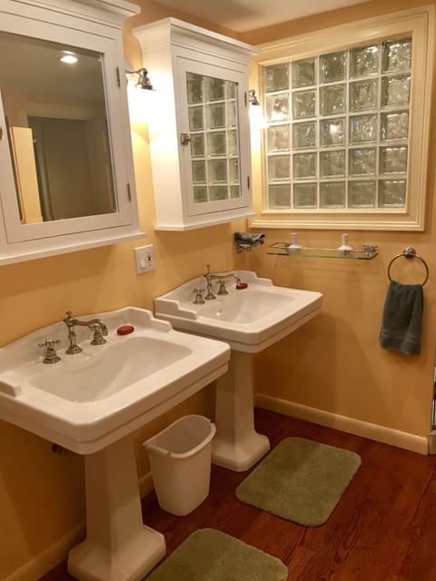 Two sink, oversize bath tub and separate shower bath