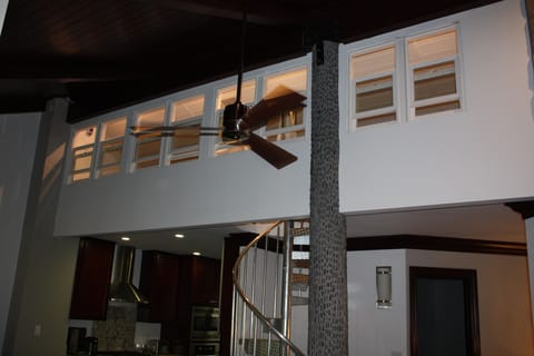 View of Kids Loft Bedroom from Great Room at night