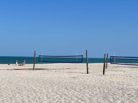 On the beach, sun loungers, beach towels