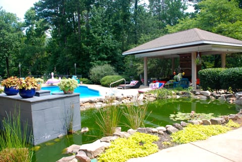 fish pond pool  waterfall pavilion w/outdoor fireplace