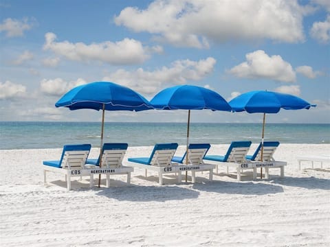 Complimentary Daily Beach Service with Chairs & Umbrellas year round excluding Thanksgiving and Christmas days
