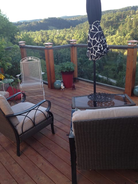 Deck has glass railing for unobstructed view