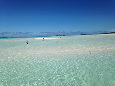 On the beach, sun loungers, beach towels