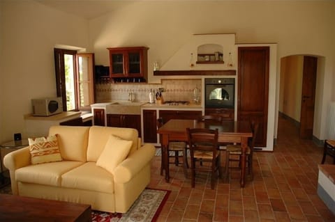 Kitchen and Living area. Note hall to right leads to two bedrooms & 2 bathrooms
