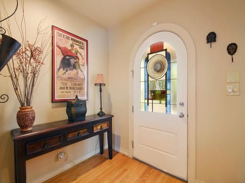 Local artisan glass work on front entrance.