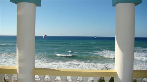 On the beach, sun loungers, beach towels