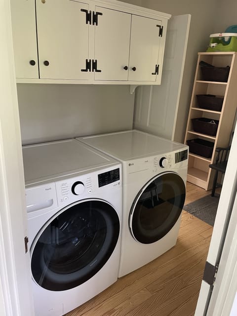 new washer & dryer, between kitchen and master bedroom
