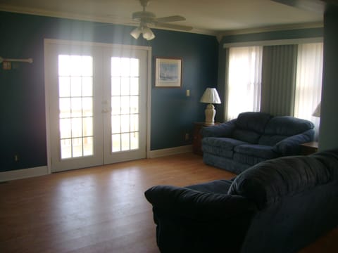 Living room with deck access.