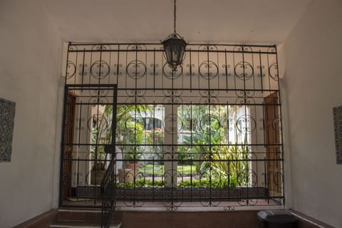 Entrnace and Garage of Villa Azteca showing 2nd bedroom door on the right.