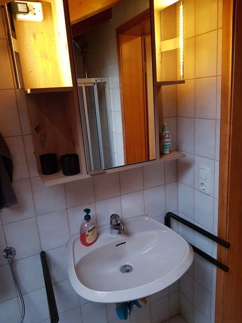 Combined shower/tub, hair dryer, towels, soap