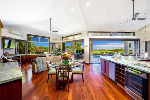 Another view of the great room looking out toward the golf course and the ocean