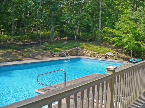 Pool with wraparound mahogany decks