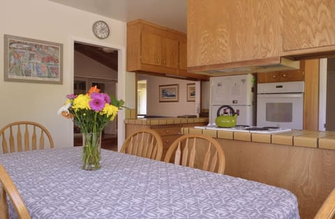 kitchen - table has seating for 6-8.  Kitchen bar has two barstools