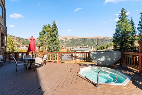 First floor shared hot tub with mountain views