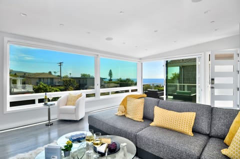 Enjoy stunning ocean views from the kitchen or living room