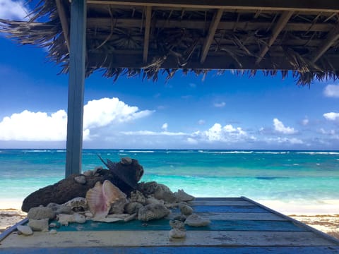 On the beach, sun loungers, beach towels