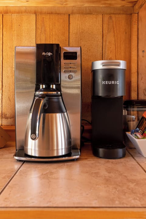 Drip machine (filters & grinder provided) and K-cup. Also electric tea kettle.