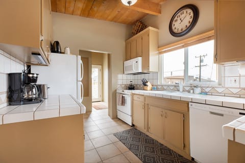 Fully stocked kitchen with almost every appliance and cooking items you desire
