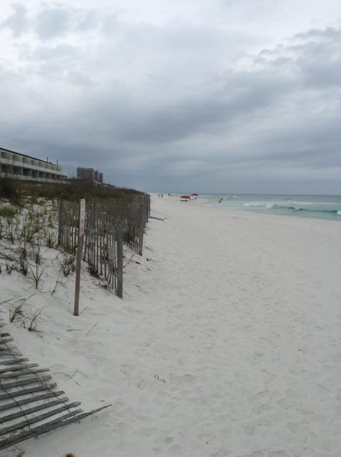 On the beach, sun loungers, beach towels