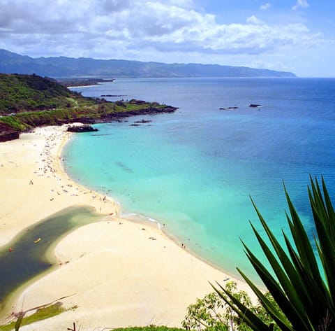 On the beach, sun loungers, beach towels