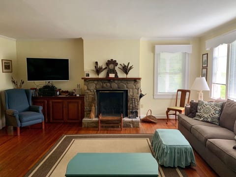 Get cozy in front of the wood-burning fireplace