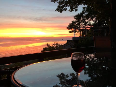 Amazing Sunsets from the deck and Cottage and with direct access to your beach 