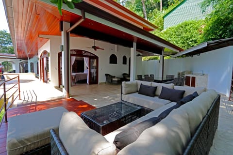 BBQ area and Jungle deck with Bali sofa and 8 seat dinning table